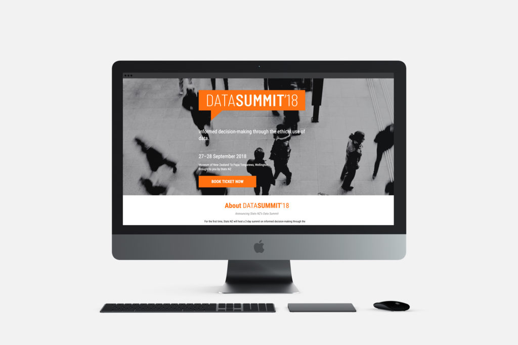 data-summit-web-2 PC screen with branded web design by conference brand specialists Wonderlab.