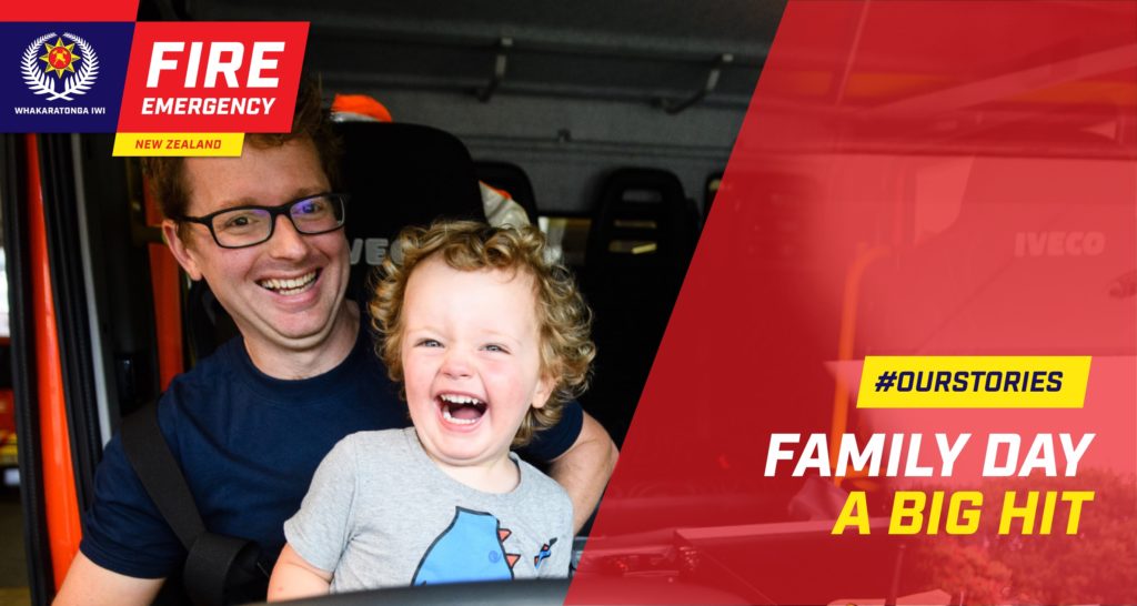 fenz-edm-banner-familyday Fireman and his daughter with a fire logo alongside, used for an EDM post by comms strategists Wonderlab.