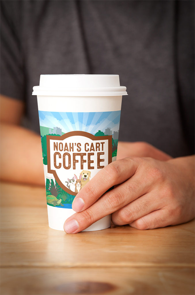 Cup 0527 2017-06-15 Person holding a branded coffee cup designed by ad agency Wonderlab