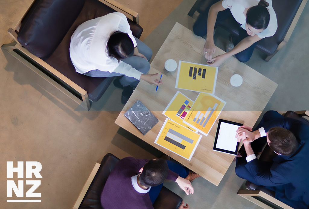 HRNZ_hero2_cropped Office scene with icon design, a new identity by brand consultants Wonderlab.