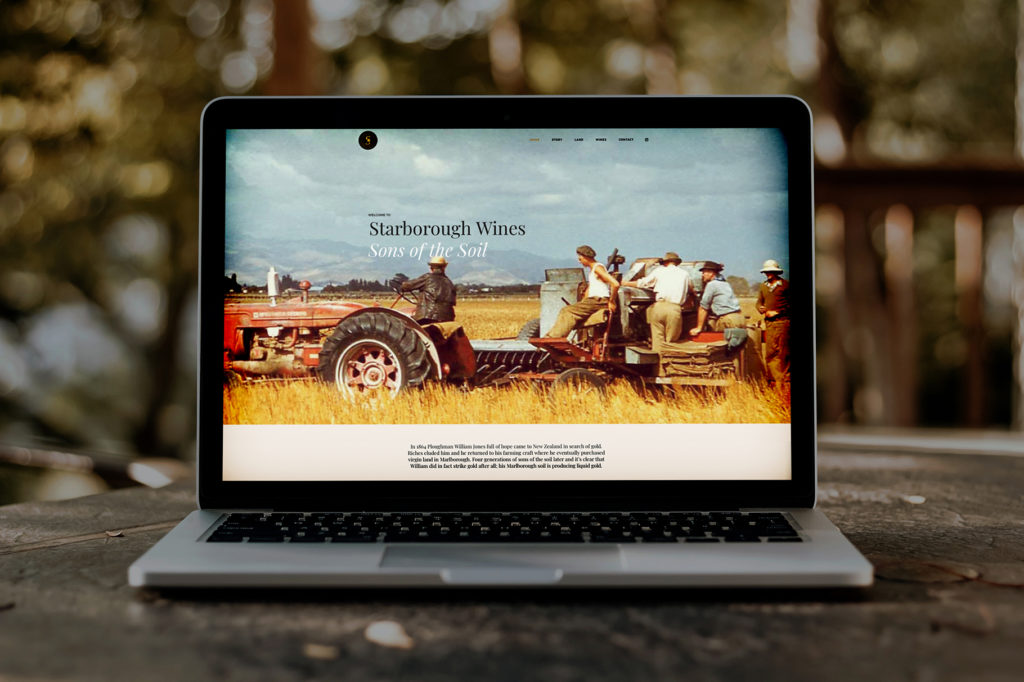 Starborough web Laptop with a vintage tractor and typography for a wine web site created by Wonderlab.