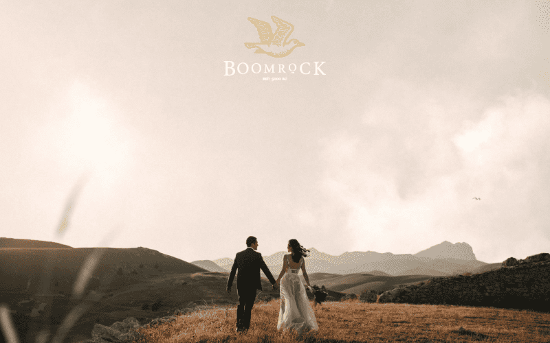 bmrk-wedding-smallest Wedding couple in a landscape with a logo super imposed- used by web design agency Wonderlab.