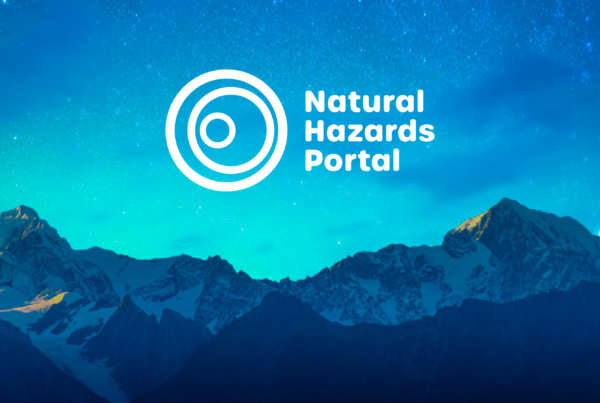 The natural hazards portal logo with mountains in the background.