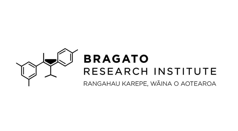 Logo of bragato research institute featuring a molecular structure and bilingual text in english and te reo māori.