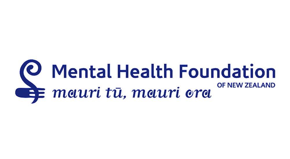 Logo of the mental health foundation of new zealand with a koru design and the māori phrase "mauri tu, mauri ora".