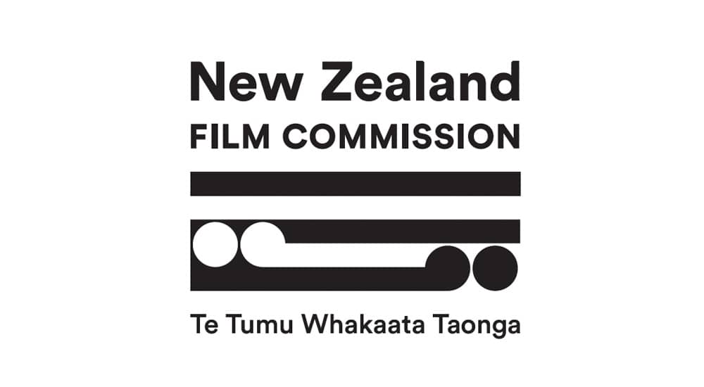 Logo of the new zealand film commission with its name in english and māori (te tumu whakaata taonga).