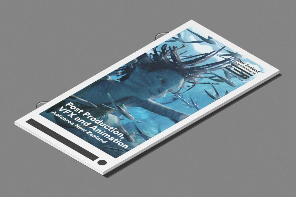 PDV-directory-cover A brochure tilted on a gray surface featuring an animated underwater scene with a character swimming among fish. The text reads, "Post Production, VFX, and Animation, Aotearoa New Zealand.