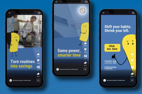 EA YouTube Shorts! Turn Routines into Savings video Three smartphones display the Electricity Authority energy-saving ads featuring a yellow cartoon character. Messages include "Turn routines into savings," "Same power, smarter time," and "Shift your habits. Shrink your bill.